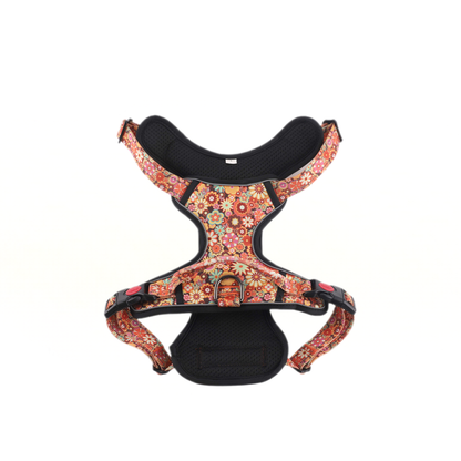 Floral patterned dog harness on a white background