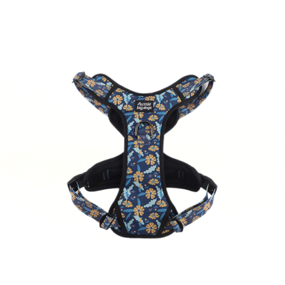 Dog harness with blue floral pattern on a white background